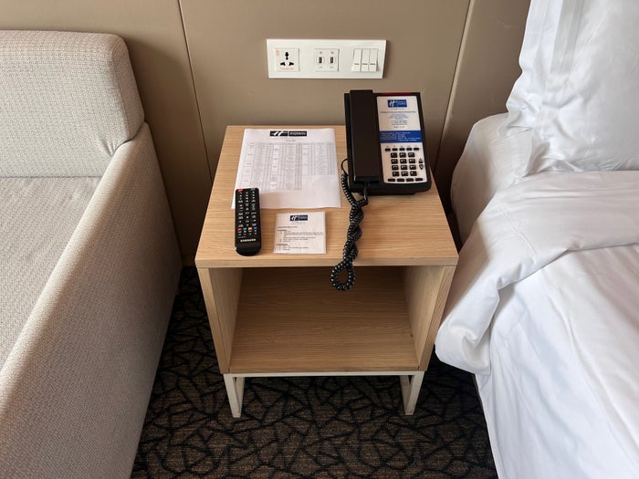 Holiday Inn Express Manila Newport City nightstand with rooms phone Holiday Inn Express Manila Newport City nightstand with rooms phone