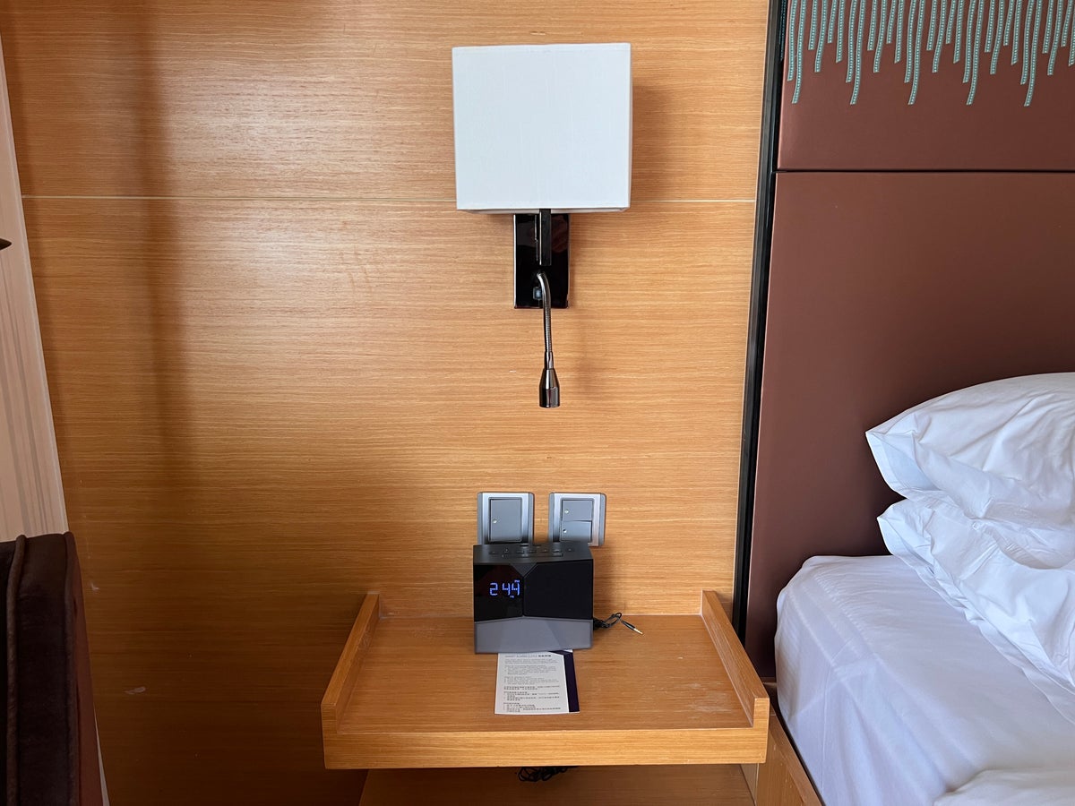 Hyatt Regency Hong Kong Sha Tin wall mounted nightstand with alarm clock