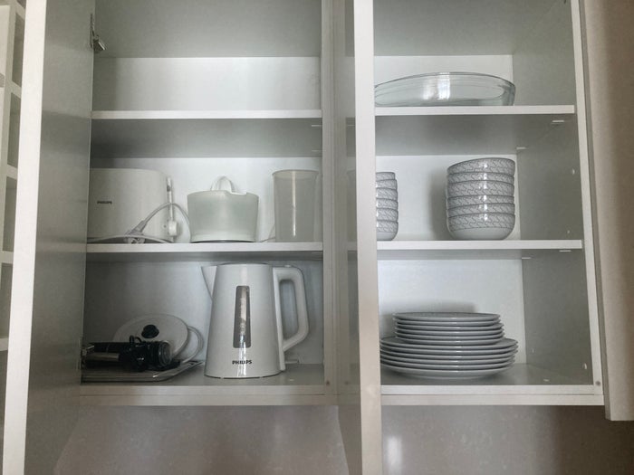 Hyatt Regency Lisbon kitchen dishes in cupboards Hyatt Regency Lisbon kitchen dishes in cupboards