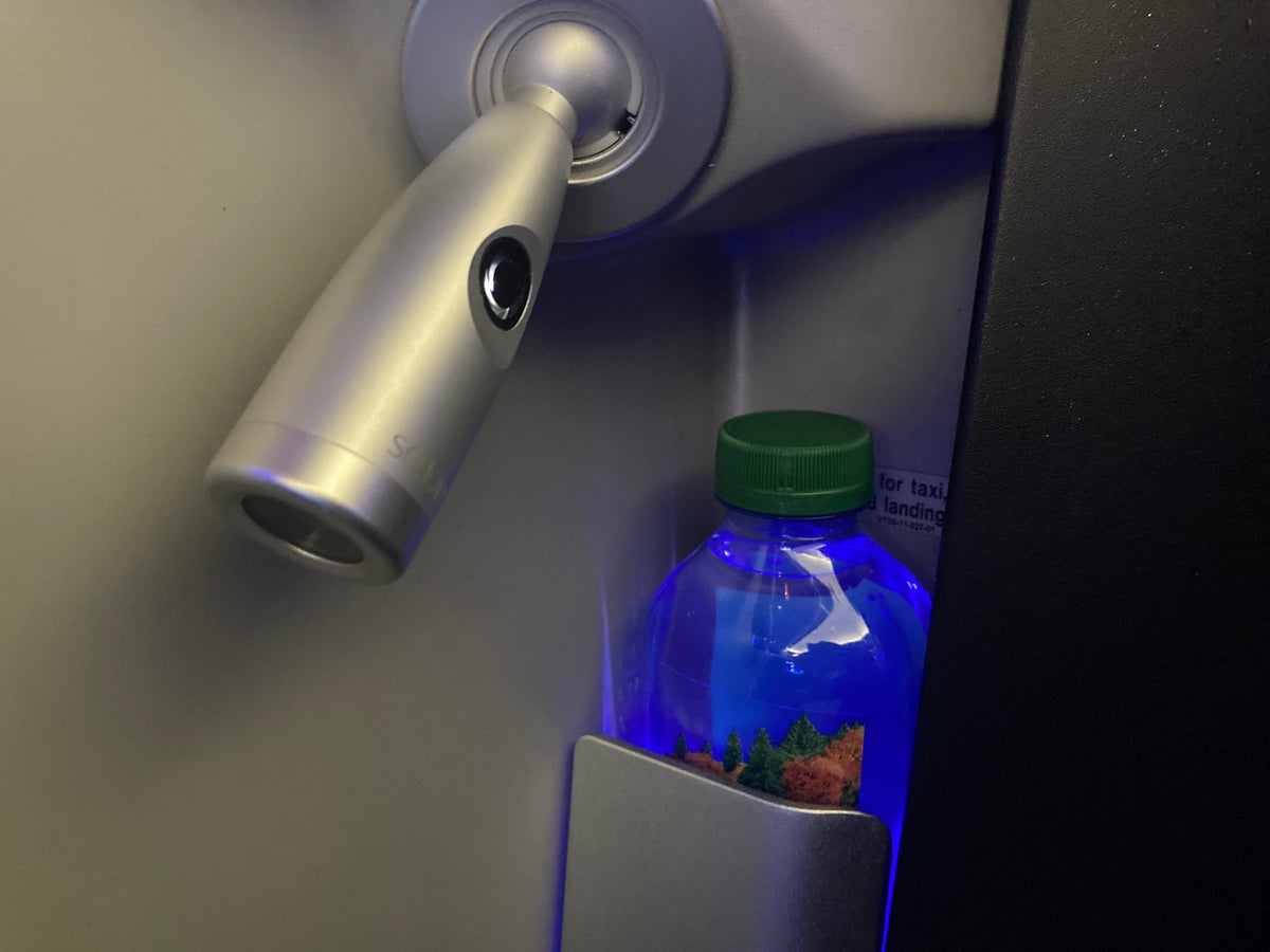 JetBlue Mint A321 seats reading lamp and bottled water