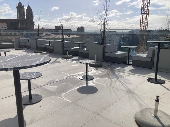 Renaissance Porto Lapa Hotel rooftop tables and chairs Renaissance Porto Lapa Hotel rooftop tables and chairs