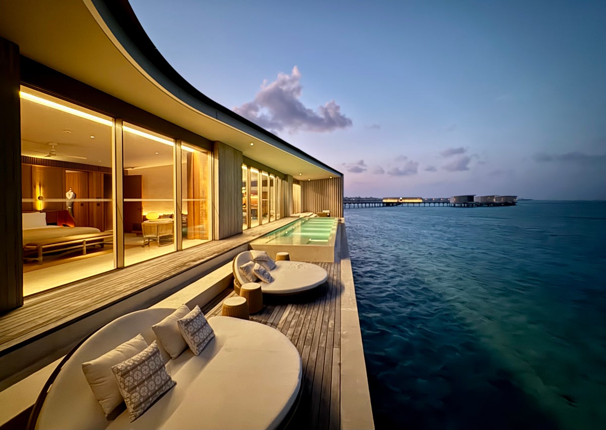 Ritz Carlton Fari Islands 2 bed overwater villa pool at dusk 