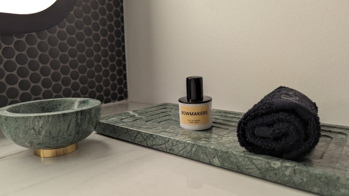 Thompson Houston guestroom bathroom mirror amenities Thompson Houston guestroom bathroom mirror amenities