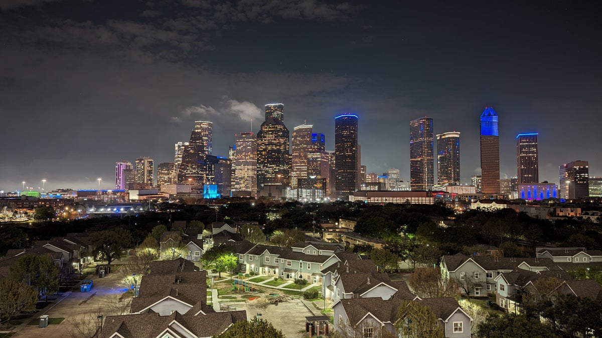 Thompson Houston pool skyline view night