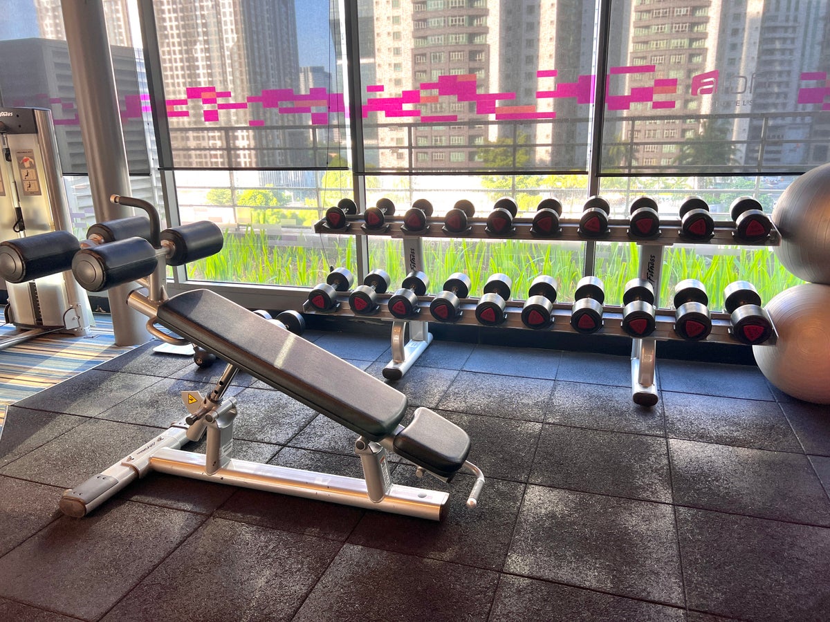 Aloft Kuala Lumpur Sentral fitness center free weights and bench