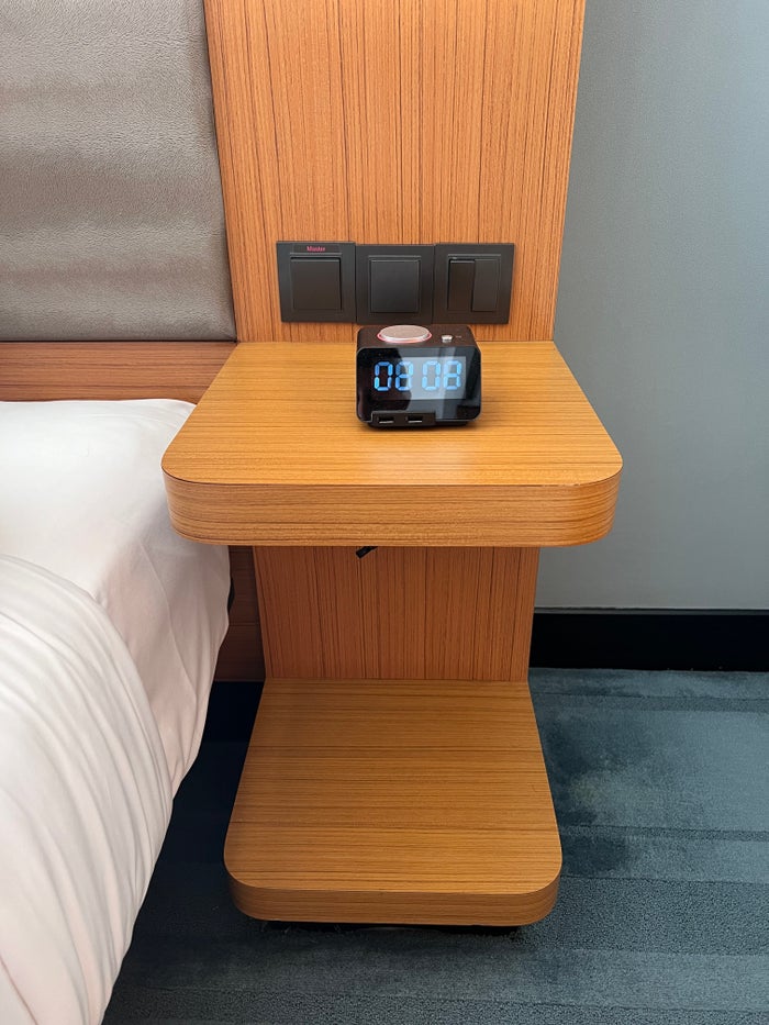 Aloft Kuala Lumpur Sentral nightstand with alarm clock Aloft Kuala Lumpur Sentral nightstand with alarm clock