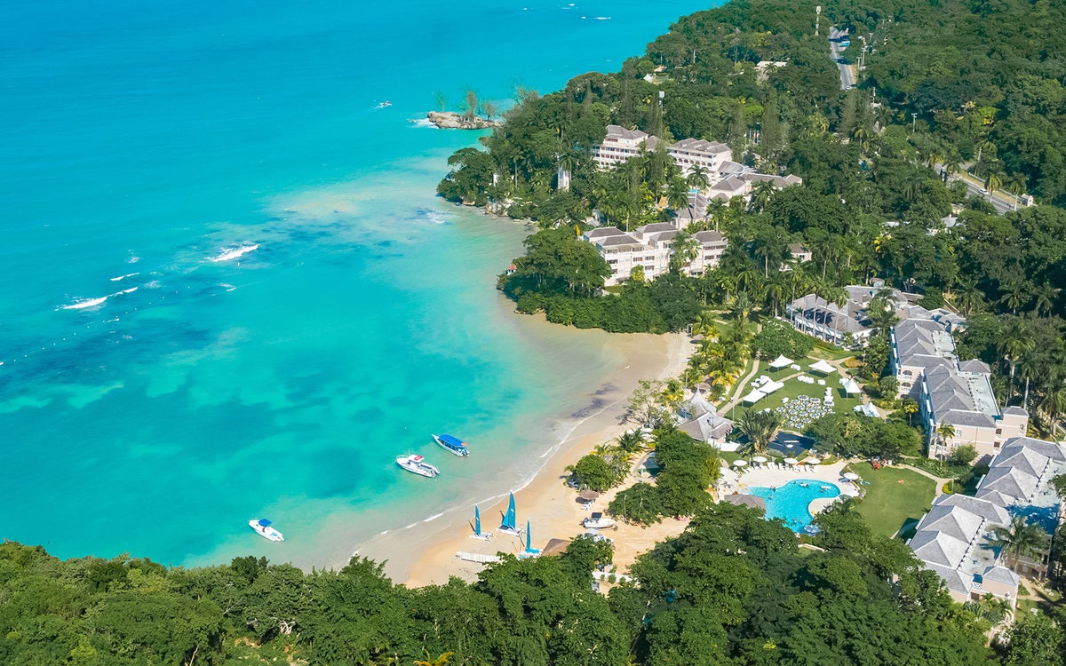 An aerial photo of the hotel and beach at Couples San Souci.