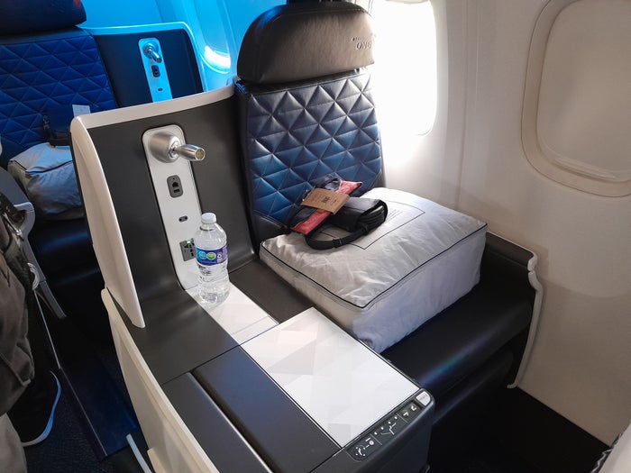 How To Upgrade to Business or First Class on Delta Air Lines