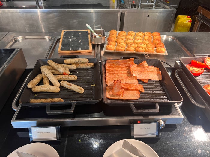 Hotel Stripes Kuala Lumpur Autograph Collection breakfast chicken ham and chicken sausage