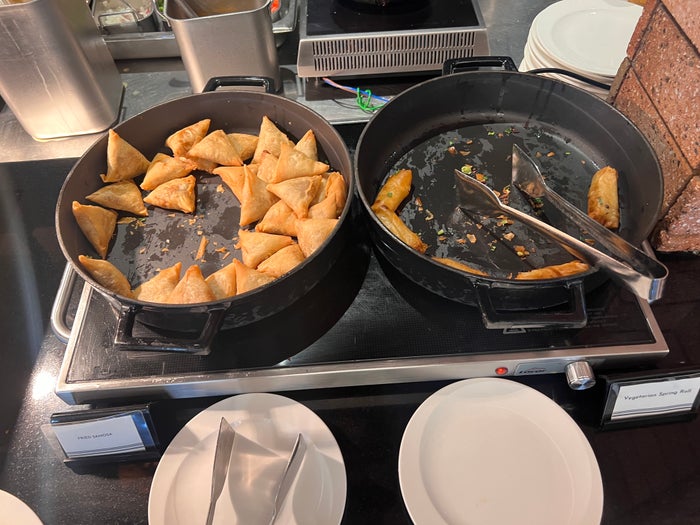 Hotel Stripes Kuala Lumpur Autograph Collection breakfast samosas and spring rolls