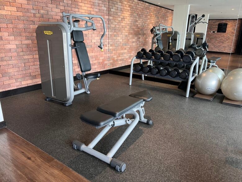 Hotel Stripes Kuala Lumpur Autograph Collection fitness center bench and weights