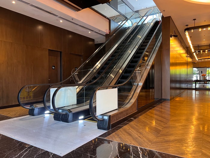 Hotel Stripes Kuala Lumpur Autograph Collection lobby escalators