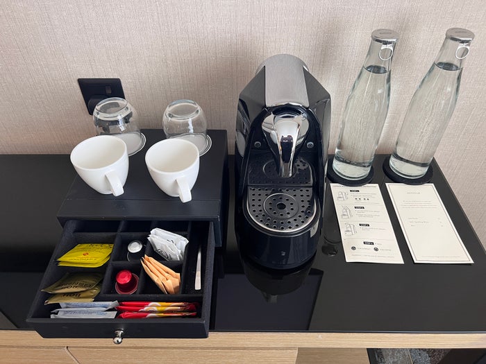 Hotel Stripes Kuala Lumpur Autograph Collection room capsule machine and coffeetea