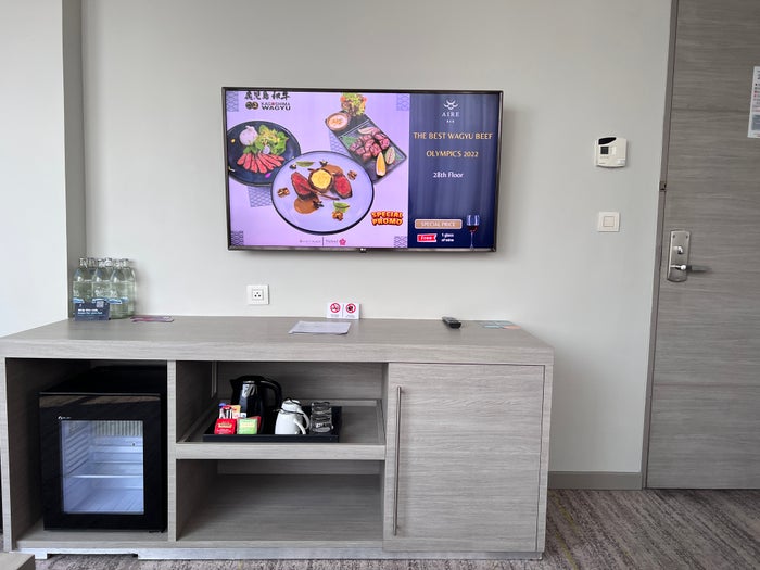 Hyatt Place Bangkok Sukhumvit room tv and console Hyatt Place Bangkok Sukhumvit room tv and console
