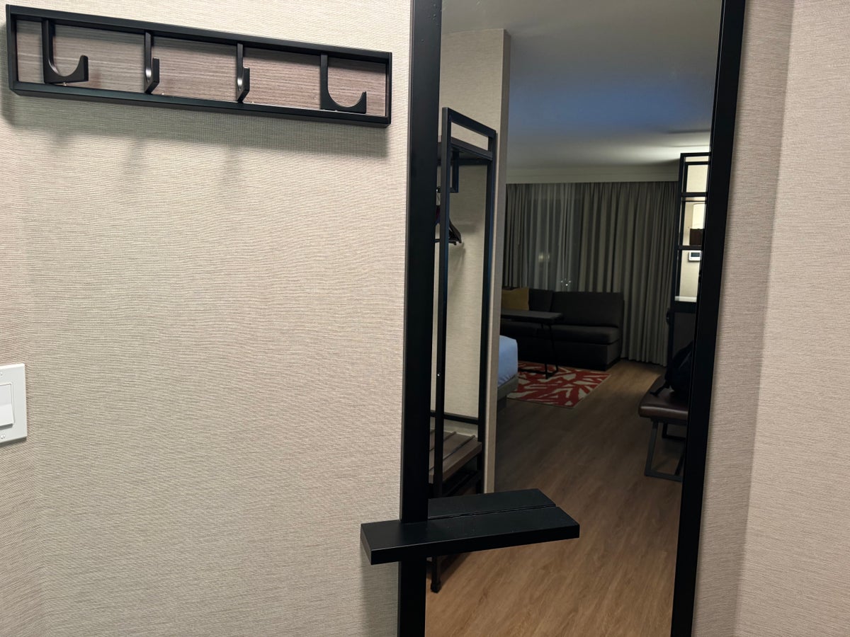 Hyatt Regency San Antonio Riverwalk bedroom entry with mirror and coat rack
