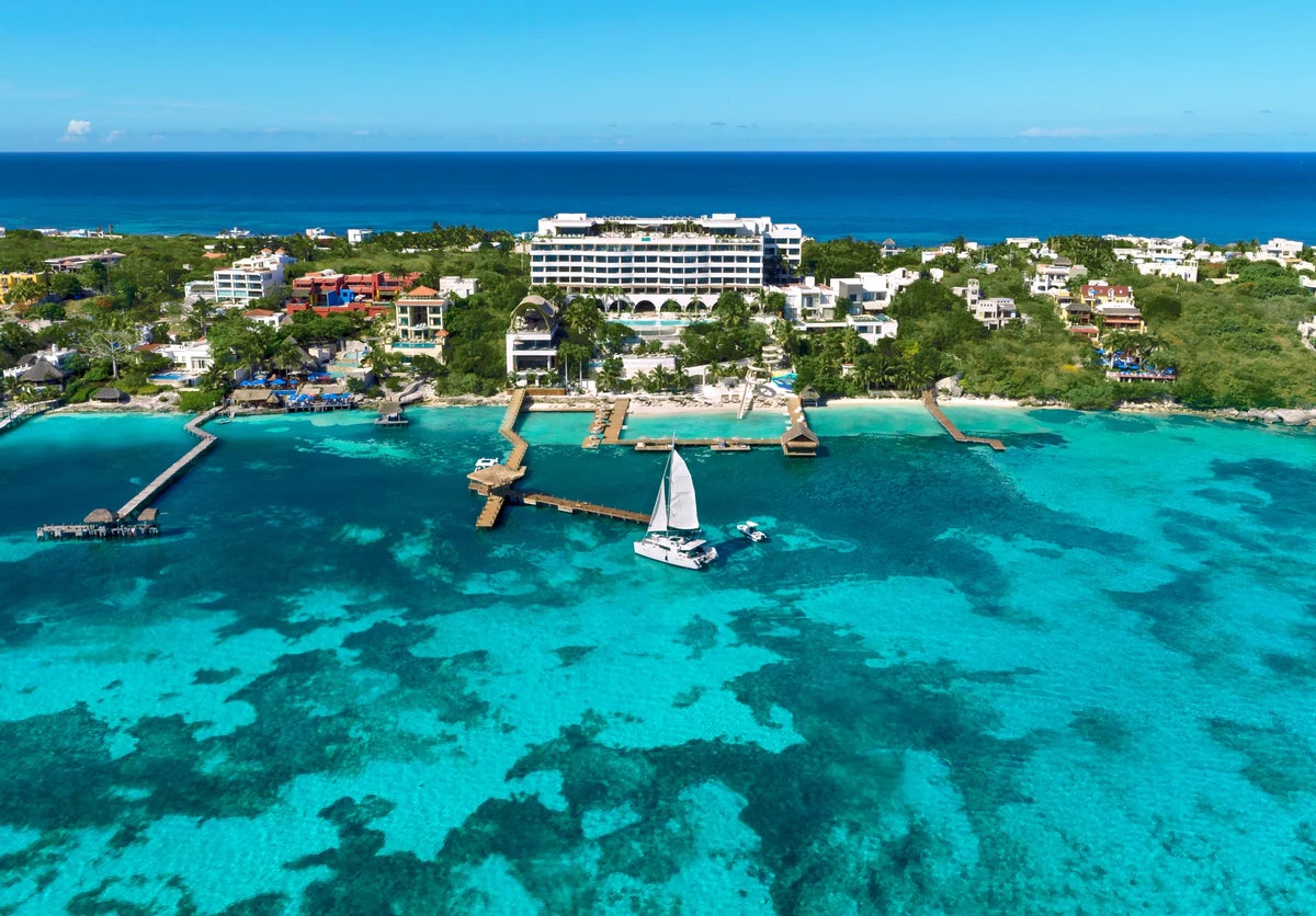 An aerial photo of Impressions Isla Mujeres by Secrets from the water.