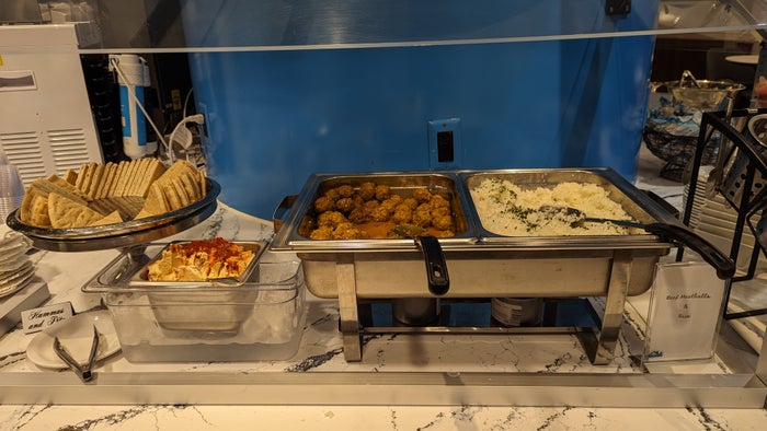 KLM Crown Lounge IAH buffet hot KLM Crown Lounge IAH buffet hot