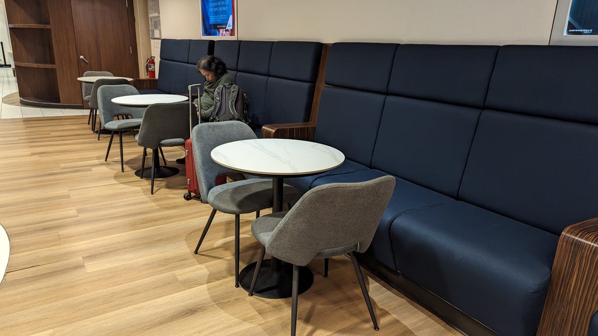 KLM Crown Lounge IAH buffet seating with tables