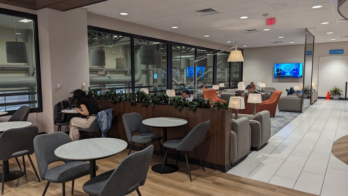 KLM Crown Lounge IAH buffet table seating KLM Crown Lounge IAH buffet table seating