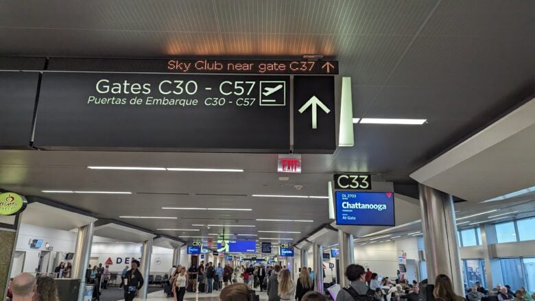 Concourse C Delta Sky Club at Hartsfield Jackson Atlanta International Airport terminal guidance signs