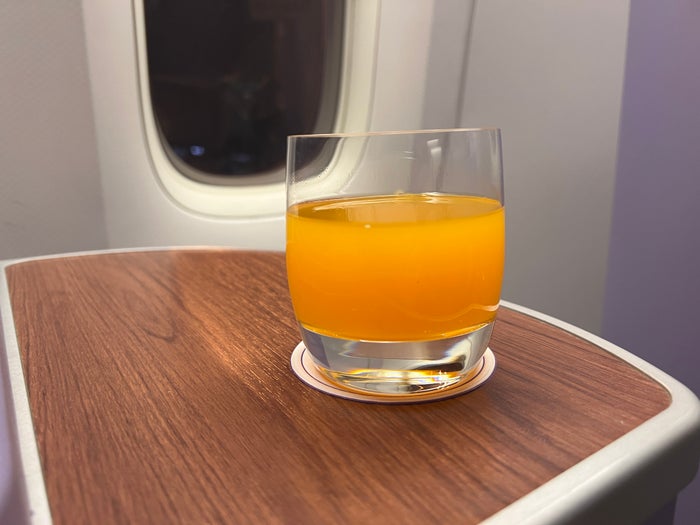 Thai Airways Royal Silk business class 777 300er predeparture drink Thai Airways Royal Silk business class 777 300er predeparture drink