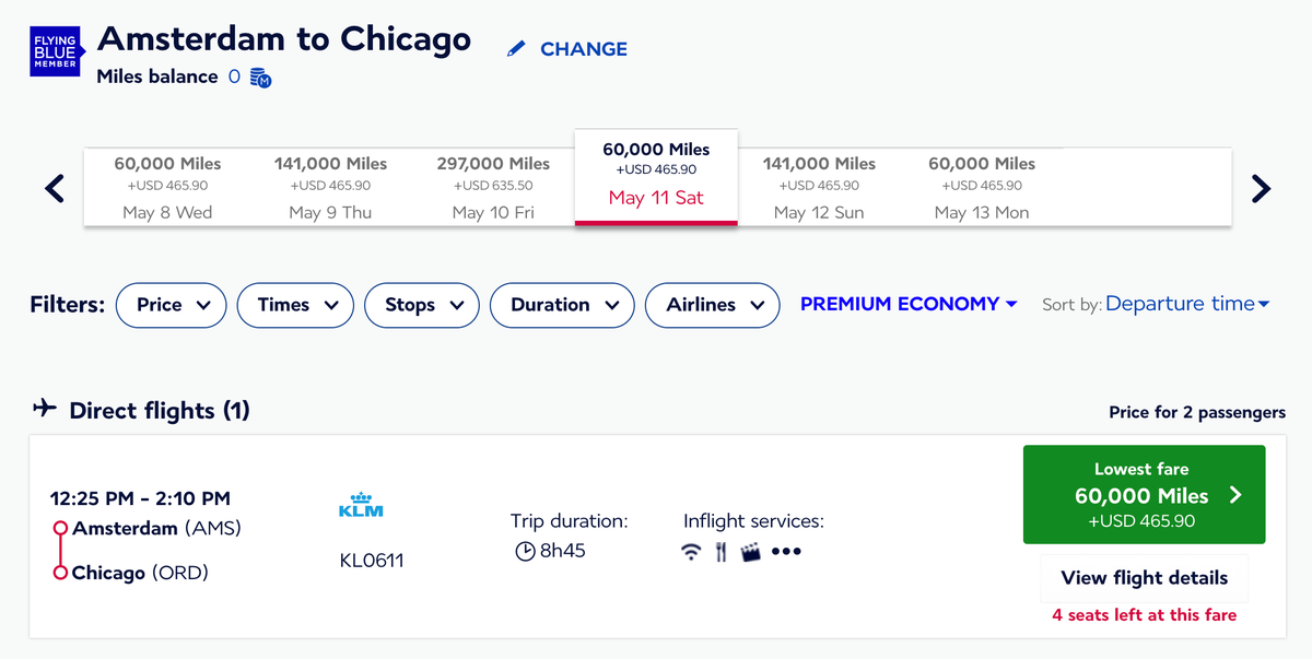 AMS to ORD cost in miles