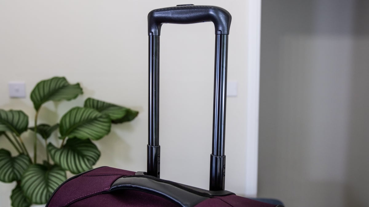 American Tourister telescopic handle