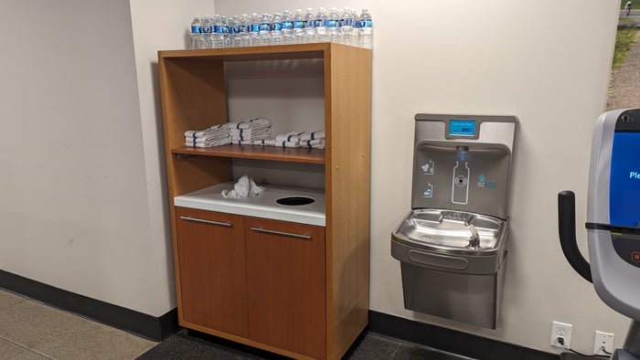Embassy Suites by Hilton The Woodlands at Hughes Landing amenities fitness center towels and water Embassy Suites by Hilton The Woodlands at Hughes Landing amenities fitness center towels and water