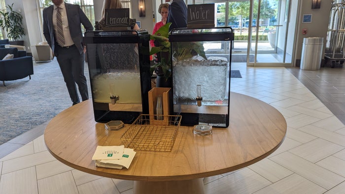 Embassy Suites by Hilton The Woodlands at Hughes Landing lobby water and lemonade Embassy Suites by Hilton The Woodlands at Hughes Landing lobby water and lemonade