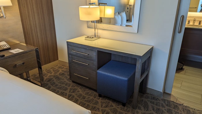 Embassy Suites by Hilton The Woodlands at Hughes Landing room bedroom dresser desk Embassy Suites by Hilton The Woodlands at Hughes Landing room bedroom dresser desk
