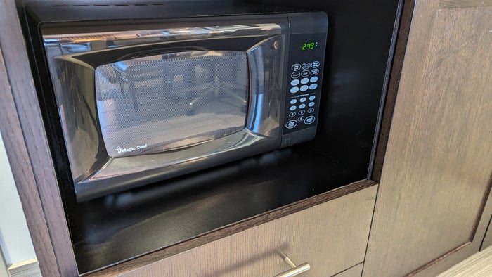 Embassy Suites by Hilton The Woodlands at Hughes Landing room living room microwave Embassy Suites by Hilton The Woodlands at Hughes Landing room living room microwave