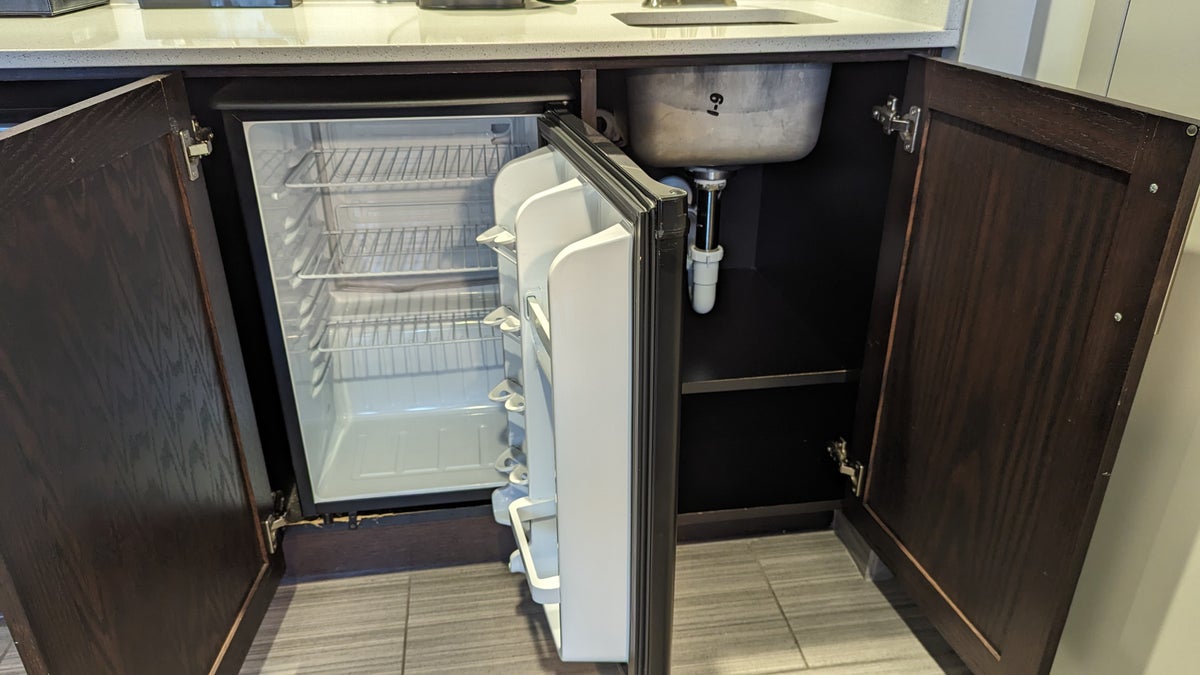 Embassy Suites by Hilton The Woodlands at Hughes Landing room living room refrigerator