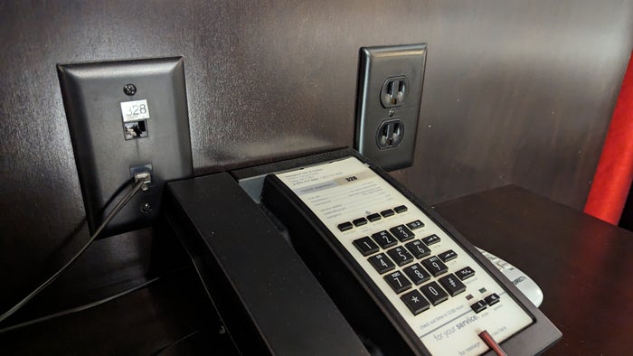 Hampton Inn Suites Hope guestroom nightstand phone and outlet Hampton Inn Suites Hope guestroom nightstand phone and outlet