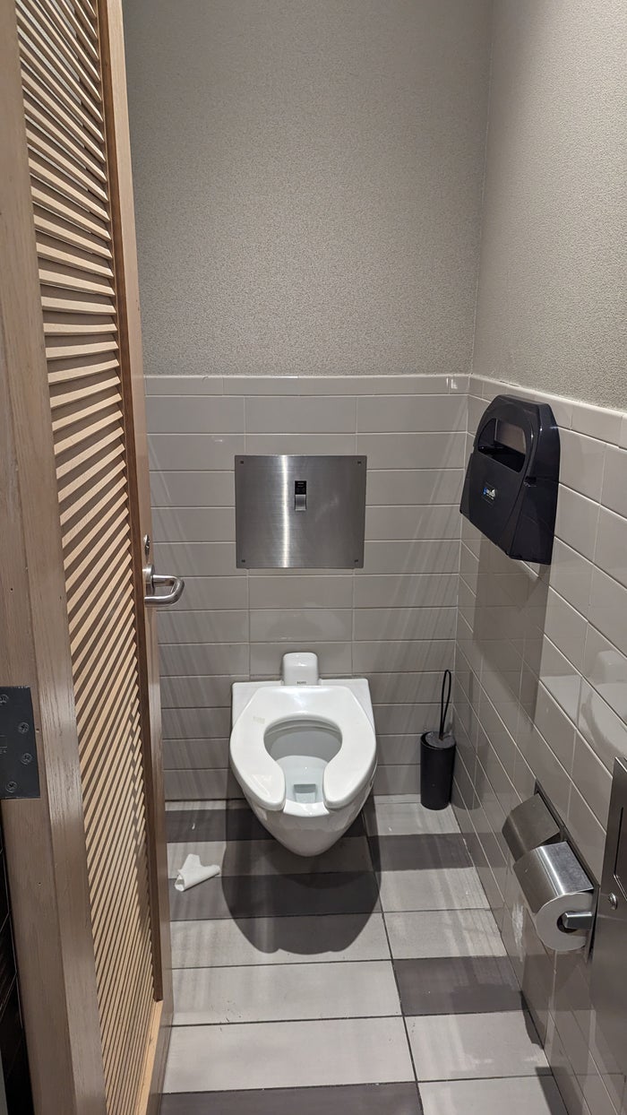 MCO Terminal B The Club MCO Gates 70 99 bthroom stall MCO Terminal B The Club MCO Gates 70 99 bthroom stall