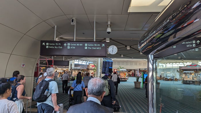 MCO Terminal B gates 70 99 entry sign MCO Terminal B gates 70 99 entry sign