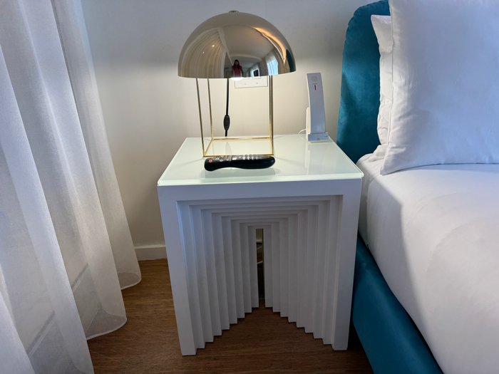 Mondrian Los Angeles deluxe studio suite nightstand with remote and phone