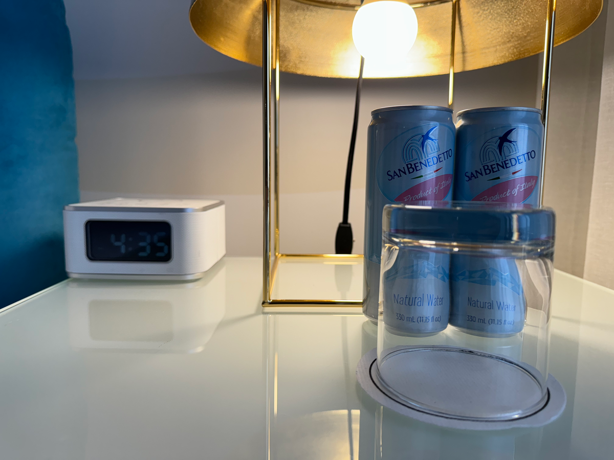 Mondrian Los Angeles deluxe studio suite nightstand with water and clock radio