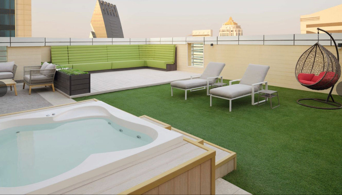Outdoor seating at a Penthouse room at the Element City Center Doha