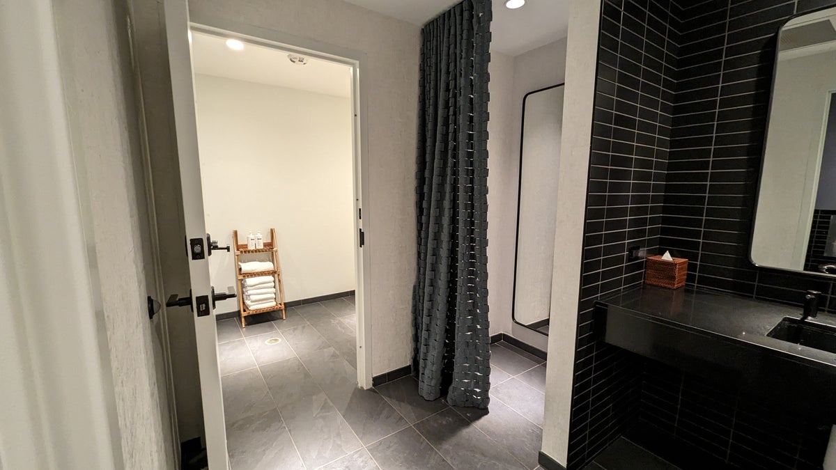 Thompson Austin amenities fitness center bathroom with shower and changing