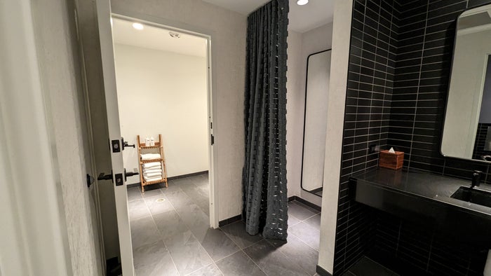 Thompson Austin amenities fitness center bathroom with shower and changing Thompson Austin amenities fitness center bathroom with shower and changing