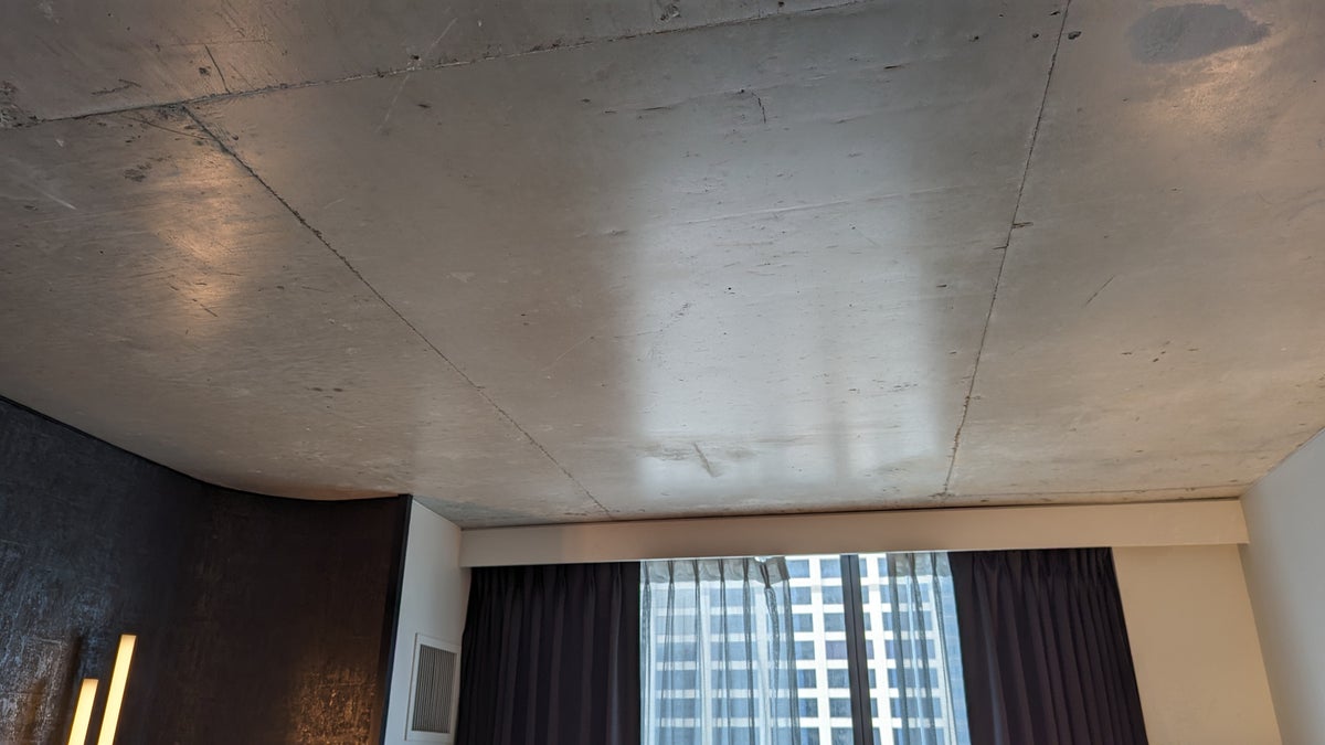 Thompson Austin room concrete ceiling