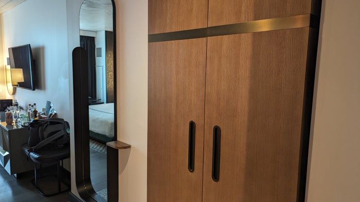 Thompson Austin room entrance closet and mirror Thompson Austin room entrance closet and mirror