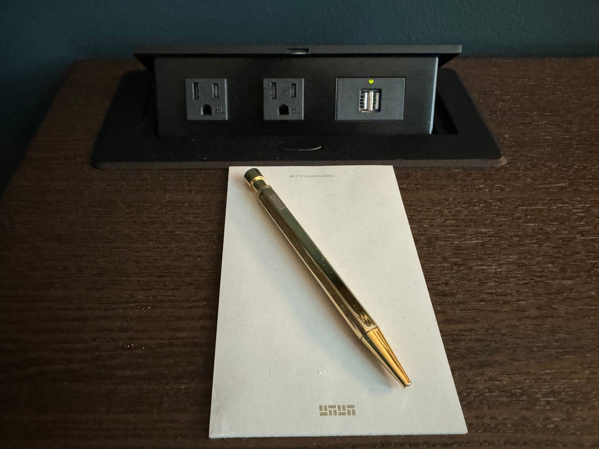 Thompson San Antonio Riverwalk bedroom desk outlets and notepad