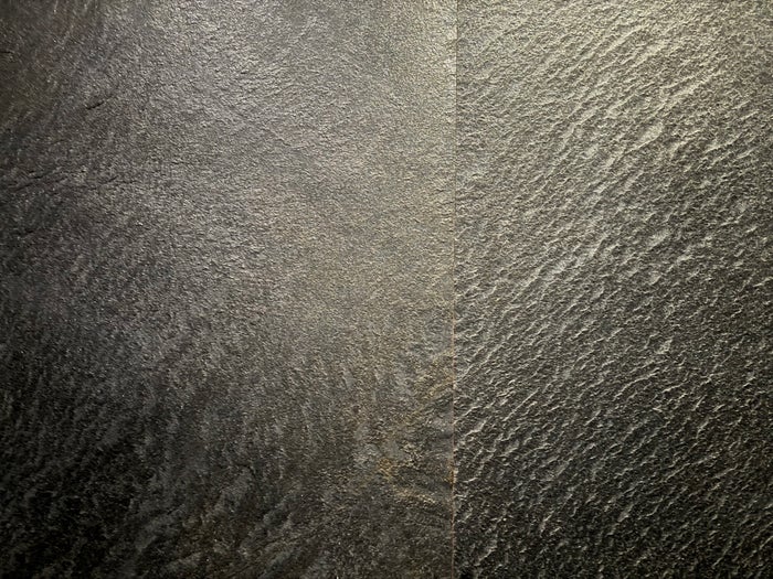Thompson San Antonio Riverwalk elevator slate wall