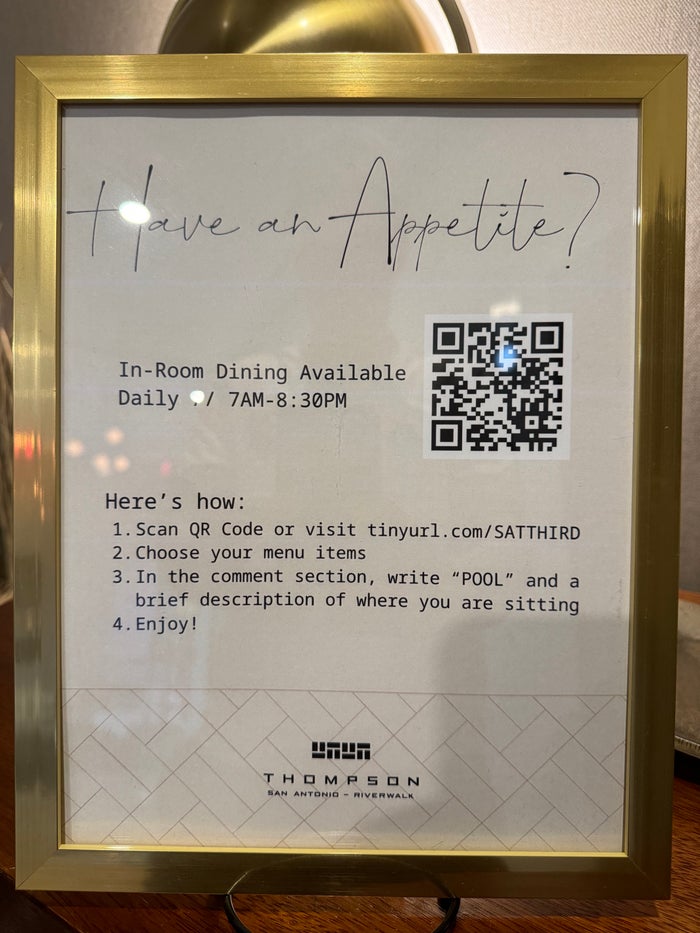 Thompson San Antonio Riverwalk in room dining sign