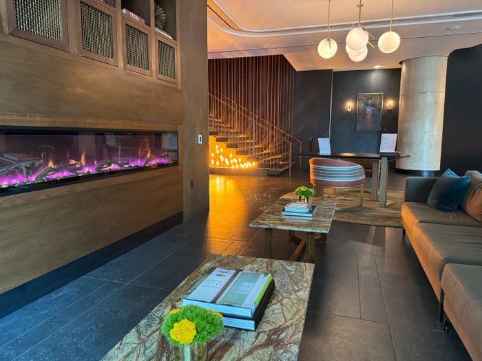 Thompson San Antonio Riverwalk lobby seating and fireplace