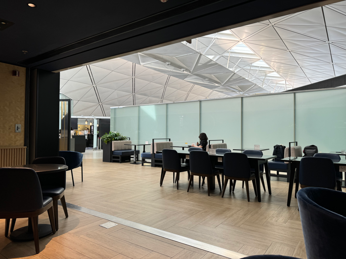 Chase Sapphire Lounge Hong Kong HKG seating in front of bar Chase Sapphire Lounge Hong Kong HKG seating in front of bar