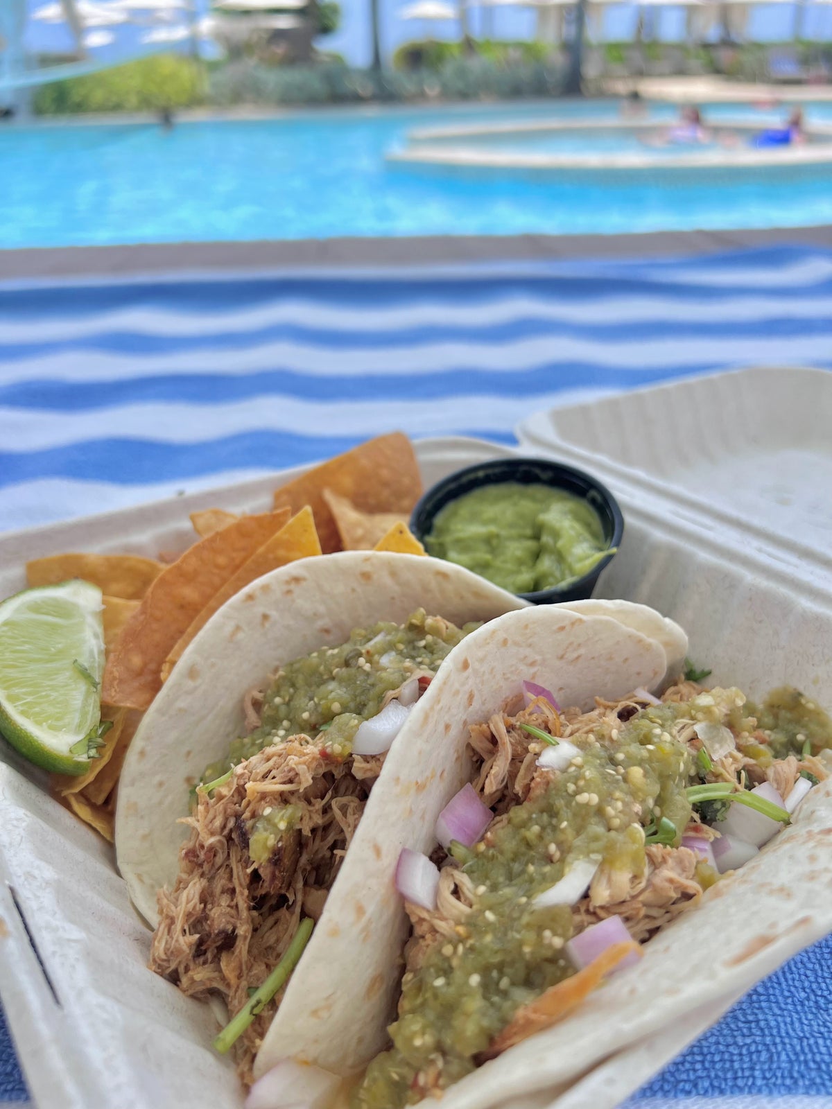 Chicken tacos by the pool