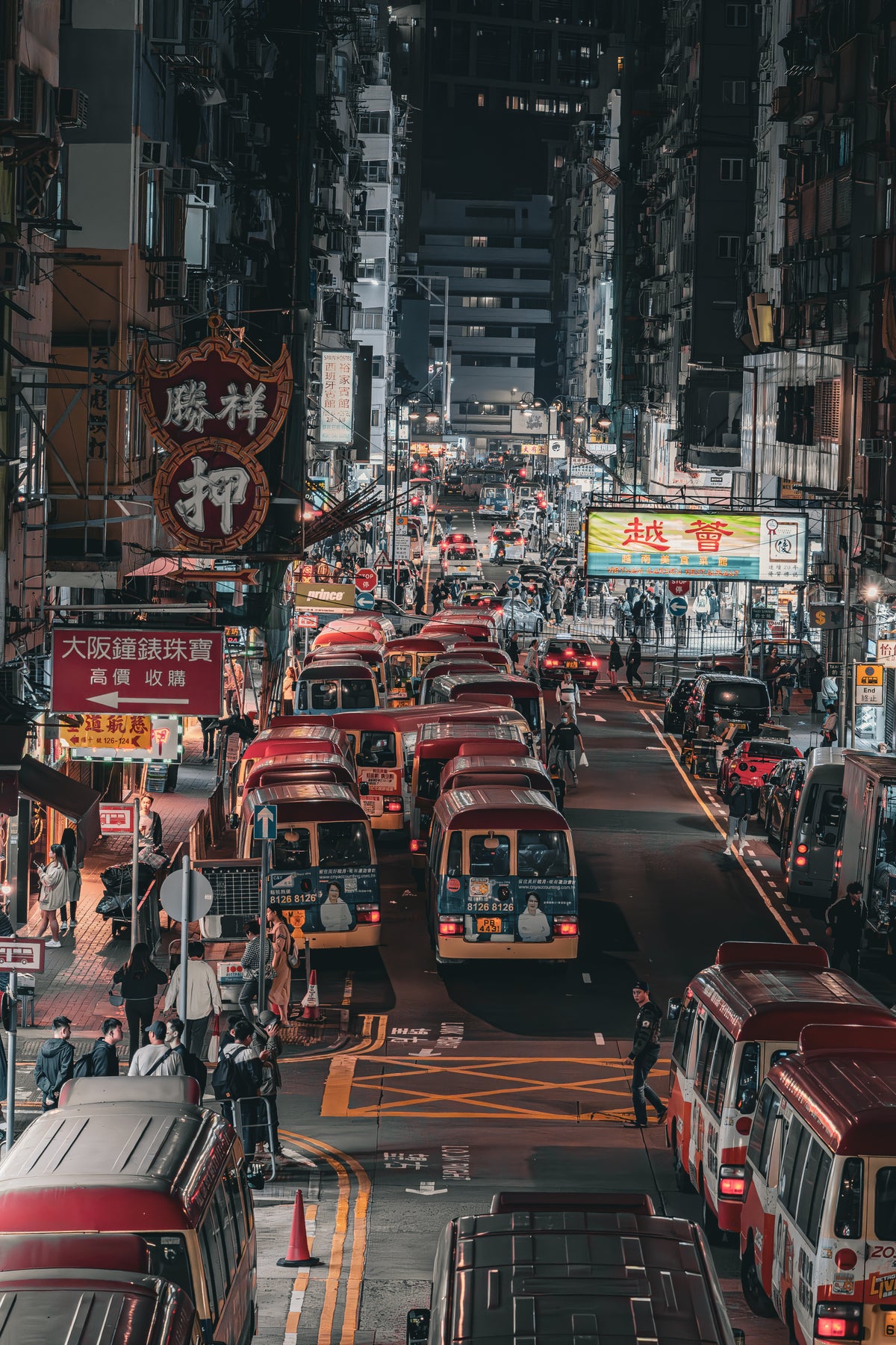 Hong Kong neon lights and buses at night Ehsan Haque