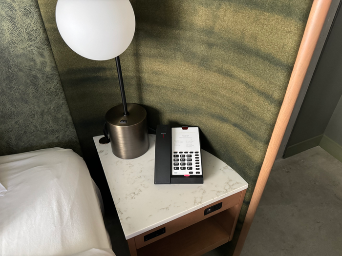 Hyatt Centric Downtown Portland room lamp and phone on nightstand Hyatt Centric Downtown Portland room lamp and phone on nightstand